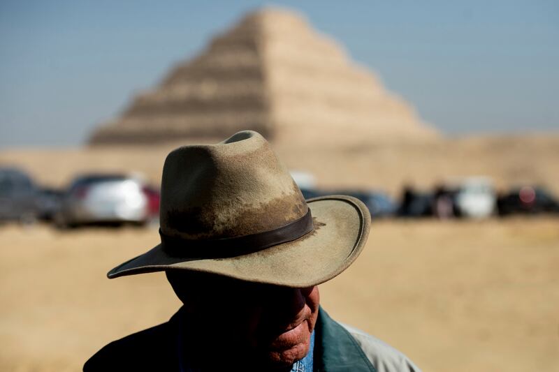 Mr Hawass, who also served as minister of state for Antiquities Affairs, with the Step Pyramid of Djoser in the background, at Saqqara. EPA 