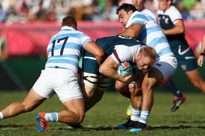 Ben Landry of the United States is tackled by Mayco Vivas and Agustin Creevy of Argentina during the Rugby World Cup 2019 Group C game between Argentina and USA at Kumagaya Rugby Stadium in Kumagaya, Saitama, Japan. Getty Images