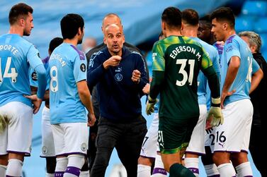 Manchester City's manager Pep Guardiola says he hopes to earn a new contract purely on merit. AFP