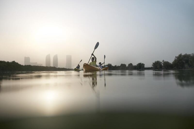 A group kayaks in the Eastern Mangroves. The campaign higlights the capital as an “inspiring destination” for those in search of cultural authenticity and diverse natural environments. Courtesy TCA Abu Dhabi