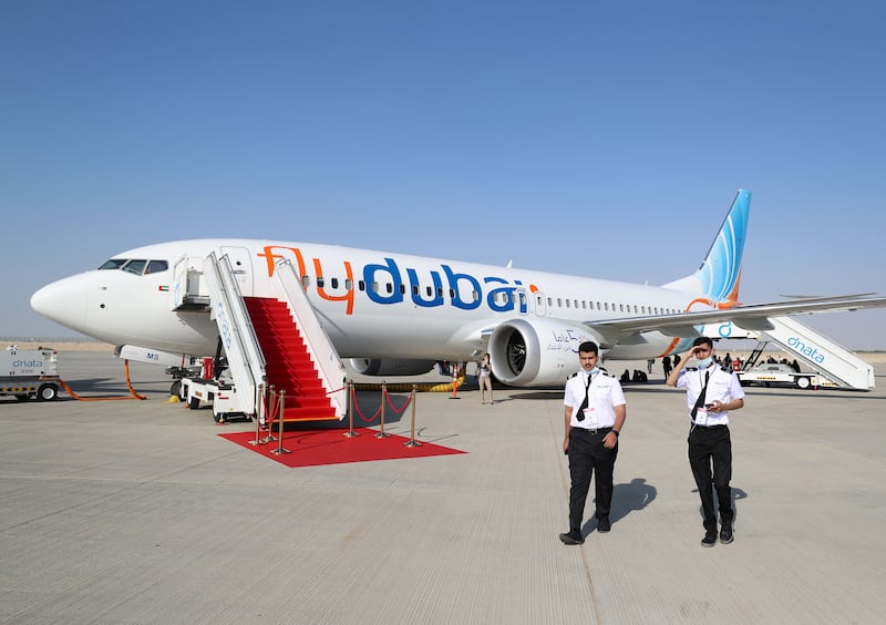 A Flydubai plane parked on the tarmac during the second day of Dubai Airshow 2021. Chris Whiteoak/ The National