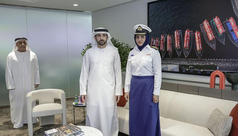 Sheikh Hamdan poses with Marine Office staff during a tour. Photo: Dubai Media Office