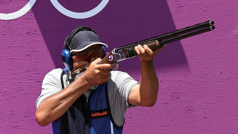 Abdullah Al Rashidi of Kuwait shoots during the men's skeet qualification round at the Asaka Shooting Range in Tokyo.