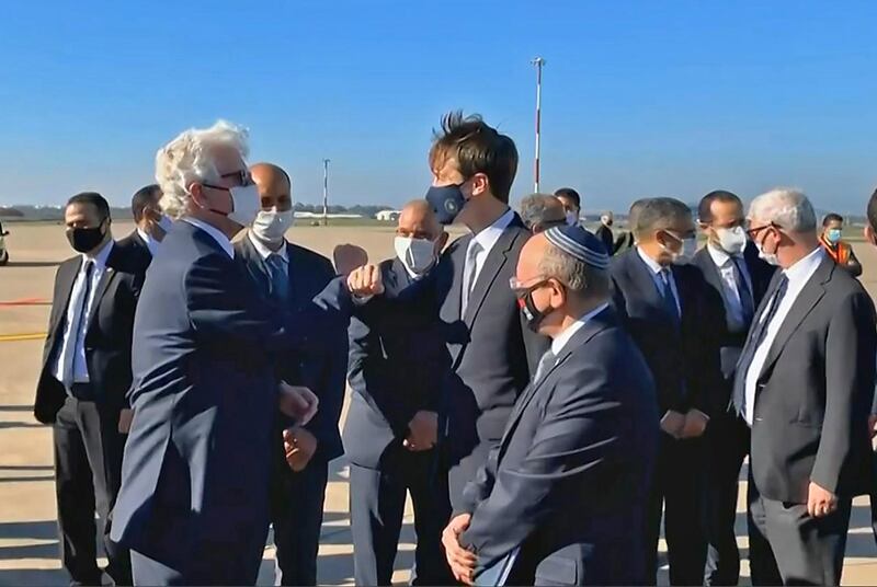 A screen grab from a handout video released by the US embassy in Morocco shows US Ambassador David T. Fischer (L) welcoming US President's advisor Jared Kushner (C) and Israeli National Security Advisor Meir Ben Shabbat (R) in Moroco's capital Rabat upon landing of the first Israel-Morocco direct commercial flight, marking the latest US-brokered diplomatic normalisation deal between the Jewish state and an Arab country. AFP
