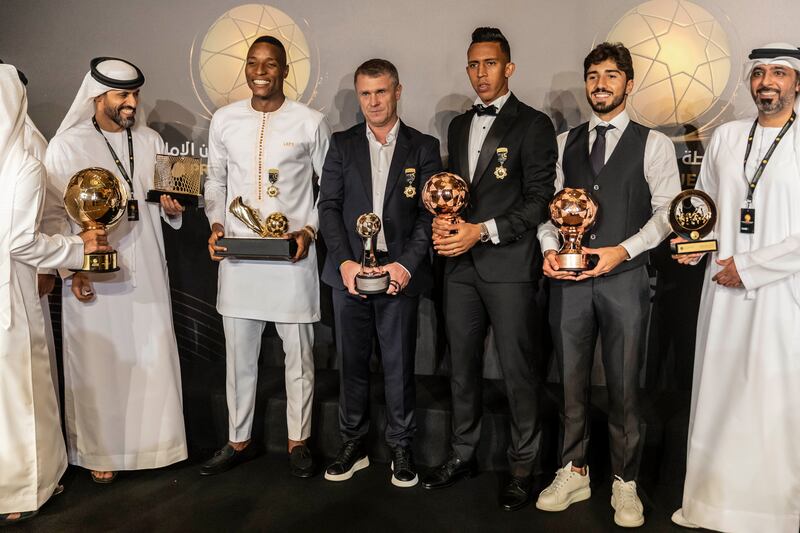 Al Ain celebrate a dominant night at the UAE Pro League Awards Ceremony at Emirates Palace, led by manager Serhiy Rebrov, centre, who picked up the prize for Best Coach. Antonie Robertson/The National
