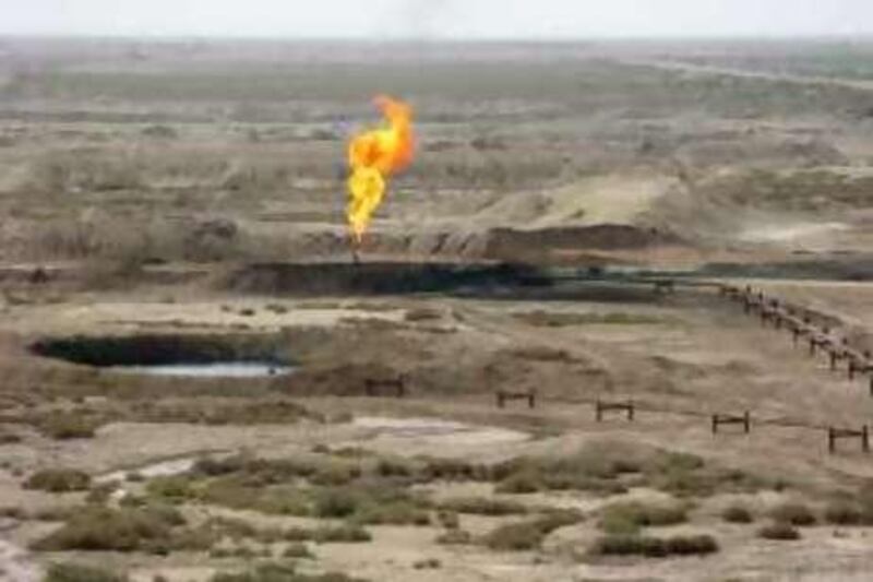 A part of Iran's Azadegan oil field is seen close to the border with Iraq, some 480 miles (800 kilometers) southwest of the capital, Tehran, Iran, Tuesday, April 15, 2008. (AP Photo/Vahid Salemi) *** Local Caption ***  VAH106_Iran_Oil_And_Sanctions.jpg