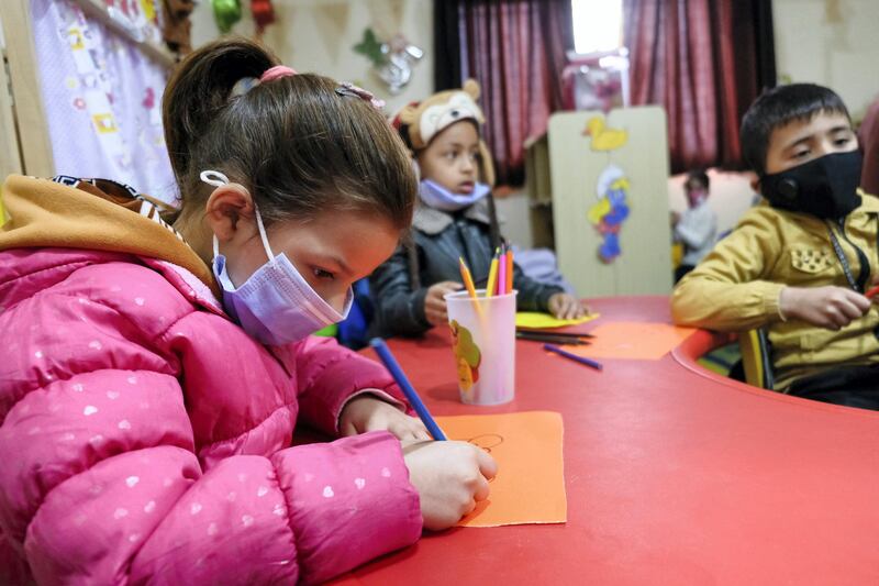 Children on their first day back to kindergarten in Al Baqa’a camp, following Covid-19 school closures. Amy McConaghy/ The National