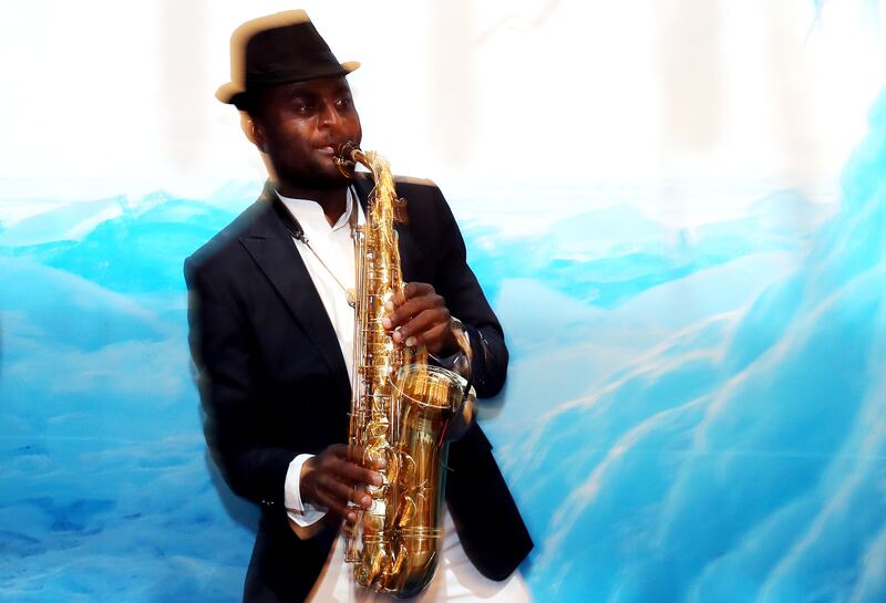 Maurice plays the saxophone at the opening night on Bluewaters Island. 