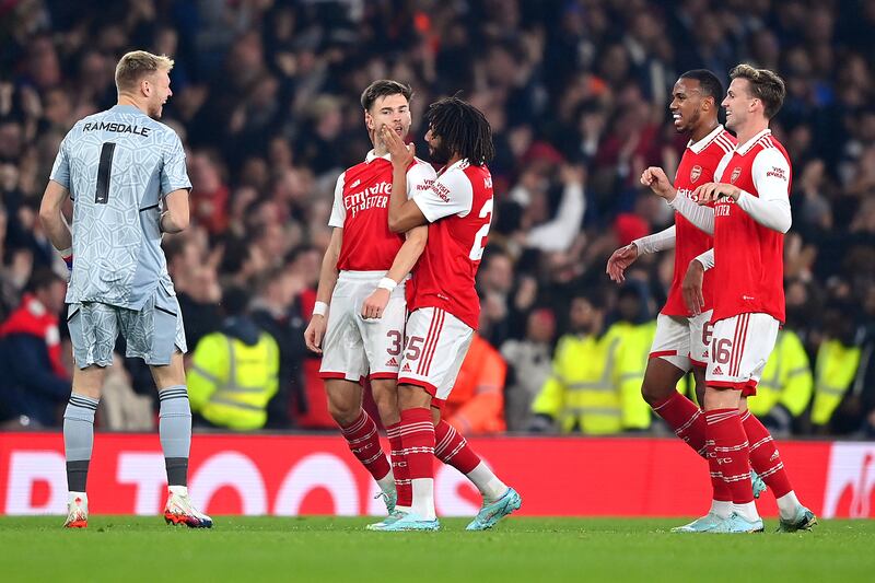 Kieran Tierney celebrates with Arsenal teammate Mohamed Elneny after scoring. Getty