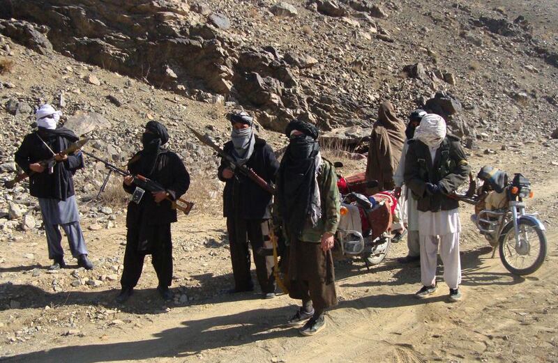 Taliban fighters on patrol in January 2010. AFP Photo

