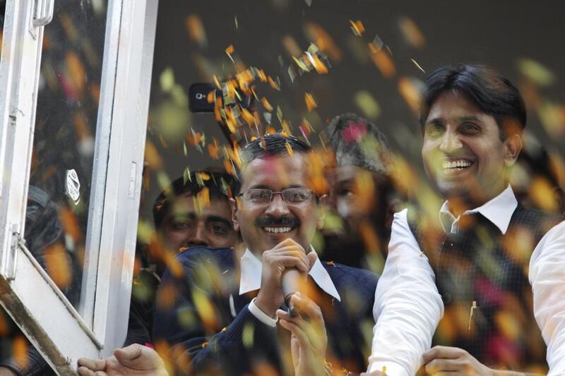 A reader says Aam Admi Party’s victory in the Delhi election is an indication that the mood of the public in India is changing. Above, Arvind Kejriwal, centre, the leader of AAP, celebrates in Delhi. Tsering Topgyal / AP Photo

