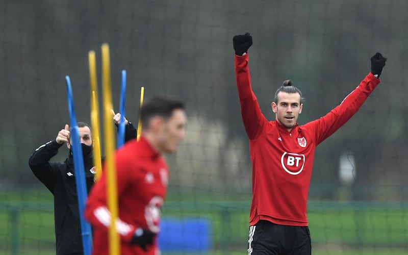 Wales captain Gareth Bale celebrates during an open training session at Vale Resort ahead of their Uefa Nations League match against Finland. Getty