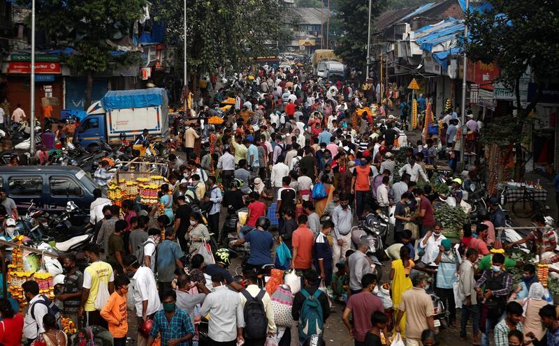 People throng a market a day before the Hindu festival of Dussehra in Mumbai, India. Reuters