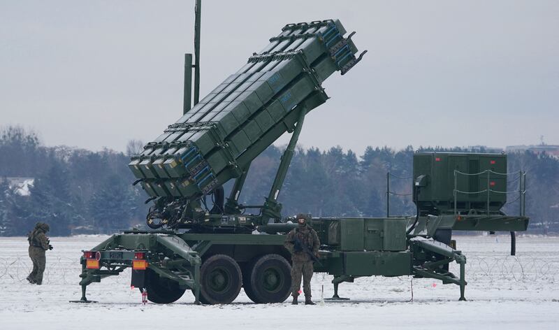 A soldier stands in front of a Patriot surface-to-air missile system during a military exercise in Poland. AFP