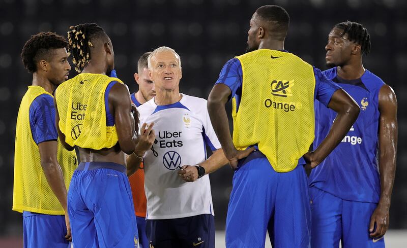 France manager Didier Deschamps talks to his players. EPA