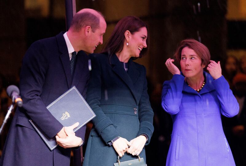 The royal couple speak with Ms Healey during a welcoming event at City Hall Plaza in Boston. EPA