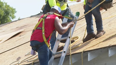 Anthony Mackie, who grew up working in the family roofing business, has teamed up with the company GAF to fix roofs for homeowners. AP