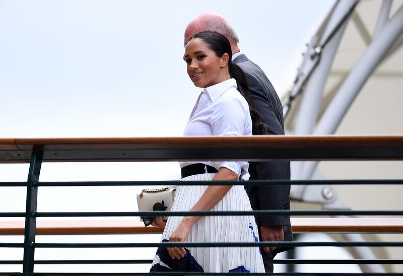 The Duchess of Sussex arrives on day twelve of the Wimbledon Championships at the All England Lawn Tennis and Croquet Club, Wimbledon. Photo: PA