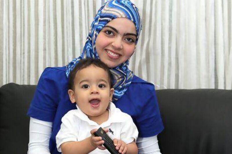 Chadia Abbas says that the in-home advice she received from the La Leche League leader Noura Al Khoori helped her breastfeed more comfortably. Pawan Singh / The National