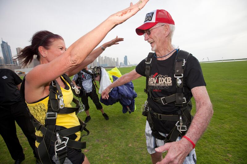 Dubai, United Arab Emirates, Apr 10, 2013 -  Dick Corbit, is congratulated by his daughter Lynn after his parachute jump at skydive. Corbit is the oldest jumper to skydive at skydive Dubai and today is his 86 birthay. ( Jaime Puebla / The National Newspaper ) 