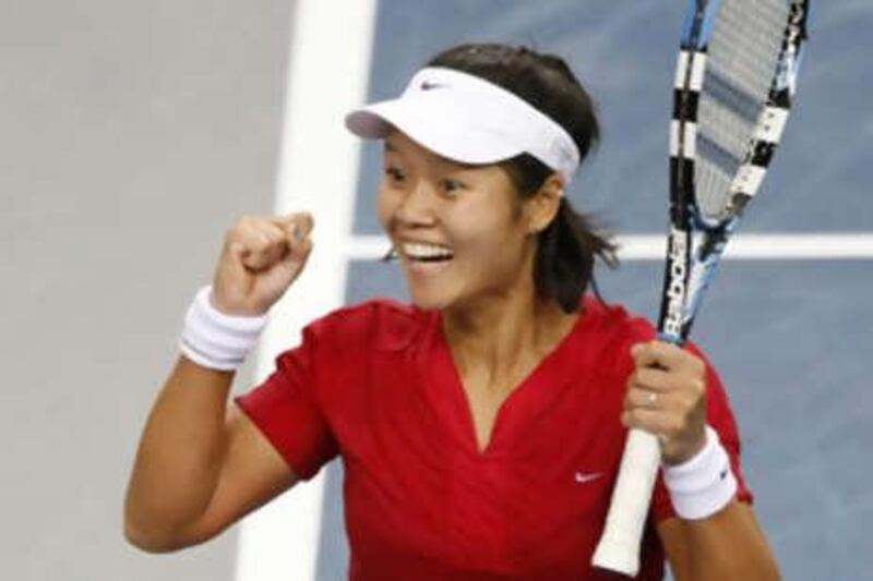 Na Li reacts after defeating Serena Williams in the second round of the Stuttgart Grand Prix.