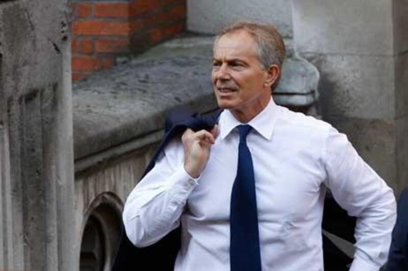 Former British Prime Minister Tony Blair arrives to give evidence at the Leveson inquiry at the Royal Courts of Justice in central London.