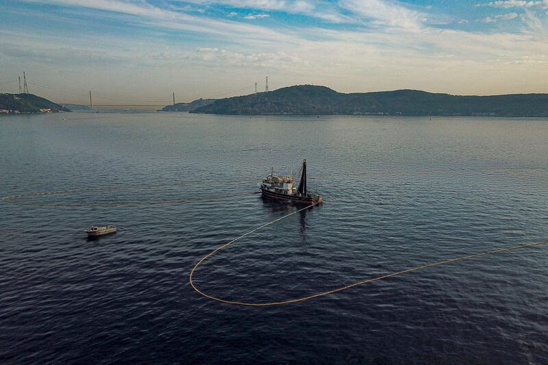 A fishing boat casts its nets in the Marmara sea off the cost of Istanbul, Turkey. It is high season for the popular variety of tuna, with shoals teeming through the Bosphorus on their way from the Black Sea to the Mediterranean. AFP