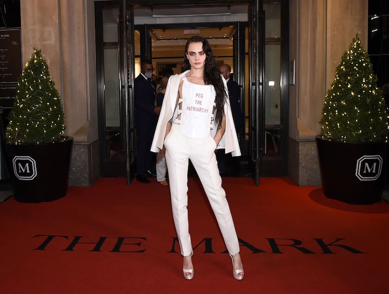 Cara Delevingne at the property's entrance before she makes her way to the Met Gala