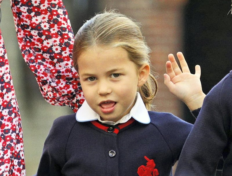 LONDON, UNITED KINGDOM - SEPTEMBER 5: Princess Charlotte waves as she arrives for her first day of school at Thomas's Battersea in London, accompanied by her brother Prince George and her parents the Duke and Duchess of Cambridge on September 5, 2019 in London, England. (Photo by Aaron Chown - WPA Pool/Getty Images)