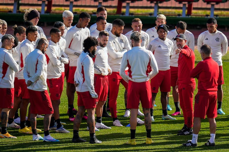 Flamengo coach Vitor Pereira instructs his players during a training session for the Club World Cup. AP 