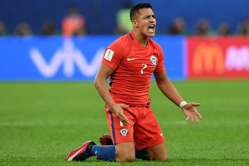 Alexis Sanchez, seen in a Chile shirt during the Confederations Cup, looks likely to continue playing in his Arsenal kit in 2017/18. Franck Fife / AFP