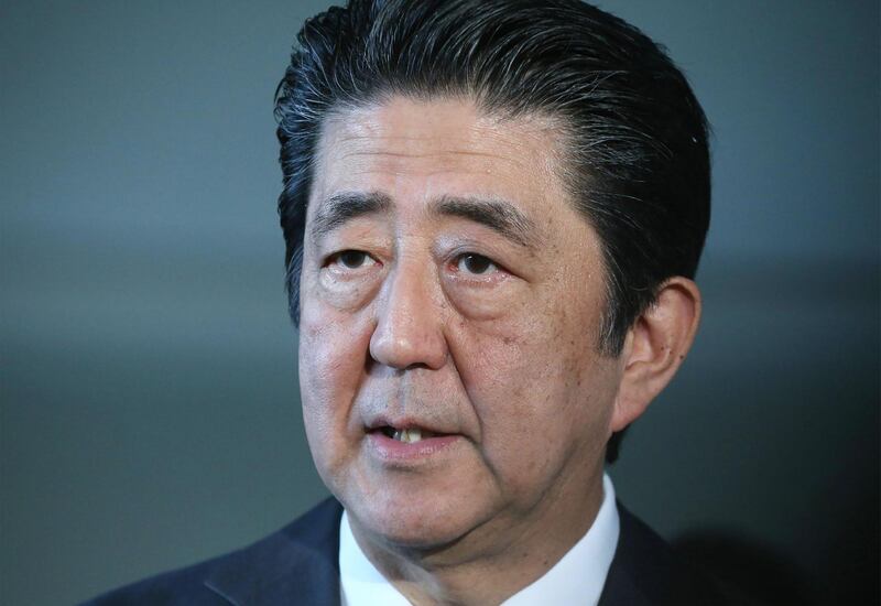 Japanese Prime Minister Shinzo Abe answers questions to reporters at the prime minister's office in Tokyo on May 28, 2019.  A knife-wielding attacker killed a 12-year-old schoolgirl and a man before stabbing himself to death in a rampage outside Tokyo May 28 that also injured more than a dozen including several children. - Japan OUT
 / AFP / JIJI PRESS / JIJI PRESS
