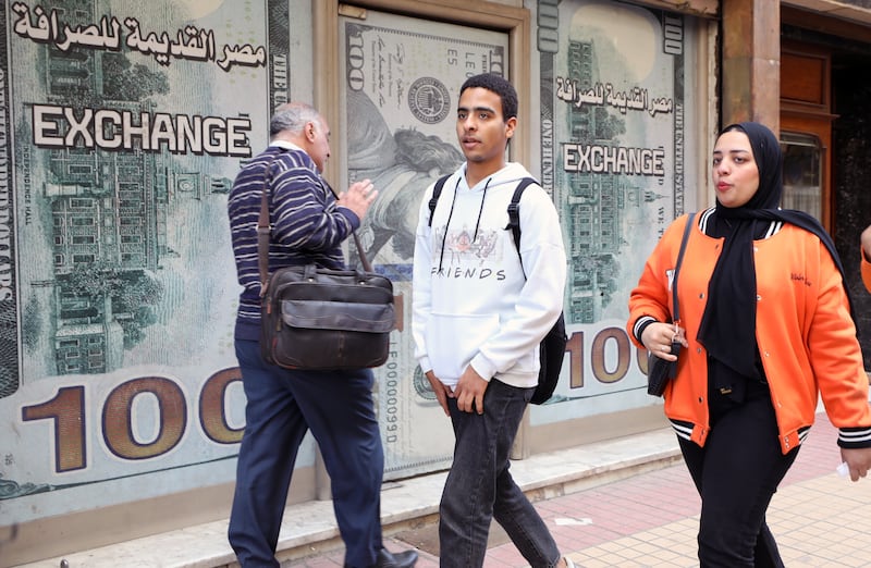 The IMF's $8 billion bailout was implemented on Wednesday, after Egypt's central bank raised interest rates and allowed the local currency to float freely without state intervention. EPA