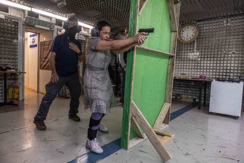 Limor Gonen practises at a shooting range in the Israeli settlement of Ariel in the occupied West Bank. The number of women applying for gun permits has soared. AFP