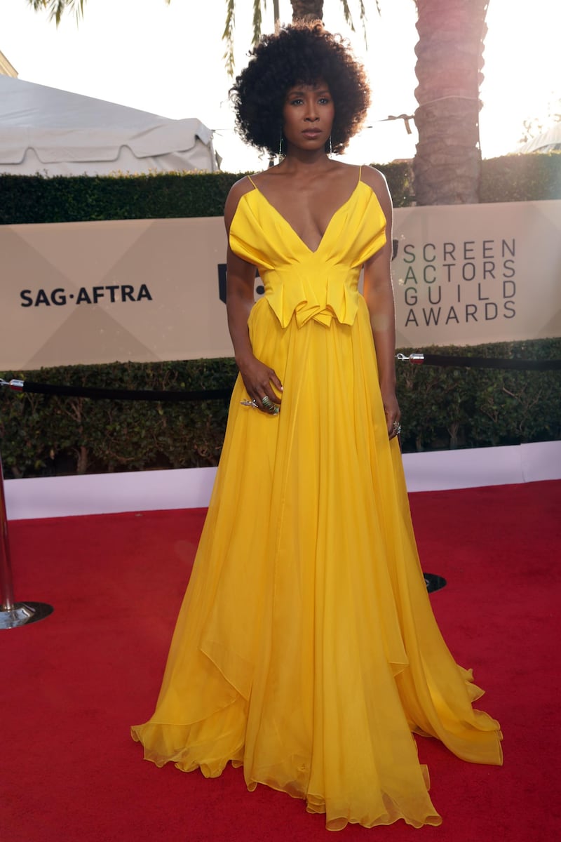 Glow star Sydelle Noel turned heads in this bold yellow Leanne Marshall gown that manages to be both structural and flowing.