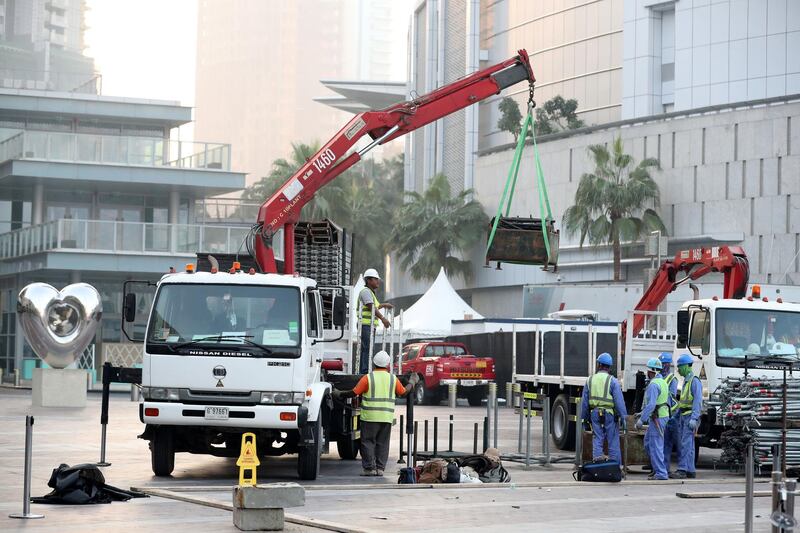 Dubai, United Arab Emirates - January 01, 2011: The clean up operations after the celebrations the night for New Years Eve 2019. Tuesday, December 1st, 2019 in Downtown, Dubai. Chris Whiteoak/The National