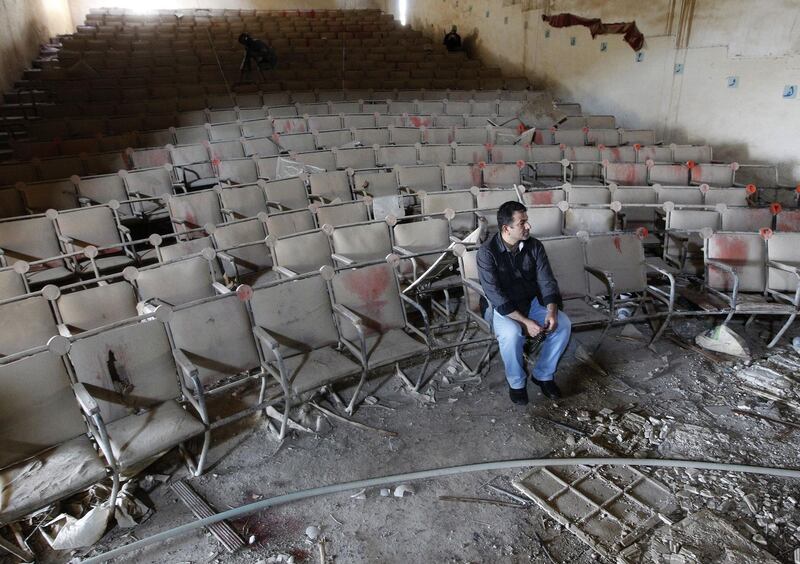 Artists gather at the Abu Nuwas Theatre that was destroyed in 2003 during the war in Baghdad, Iraq. AFP