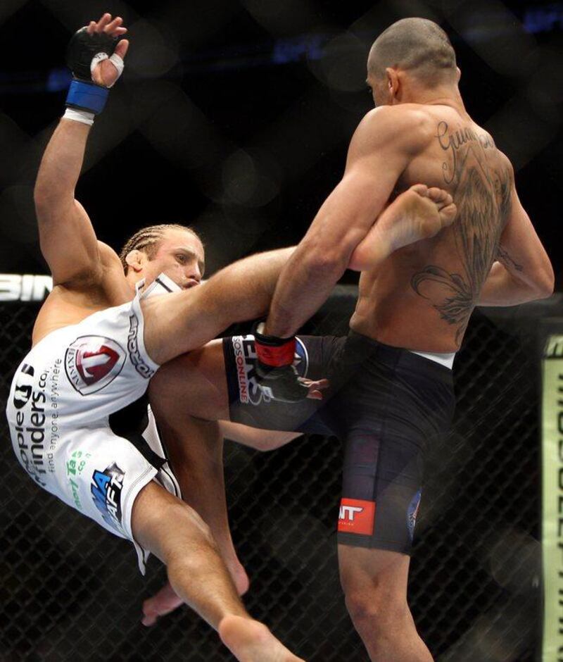 Barao won after referee Herb Dean called the fight in the first round. Tim Larsen / AP