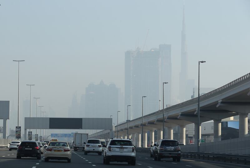 Motorists drive slowly on Dubai's Sheikh Zayed Road. Pawan Singh / The National