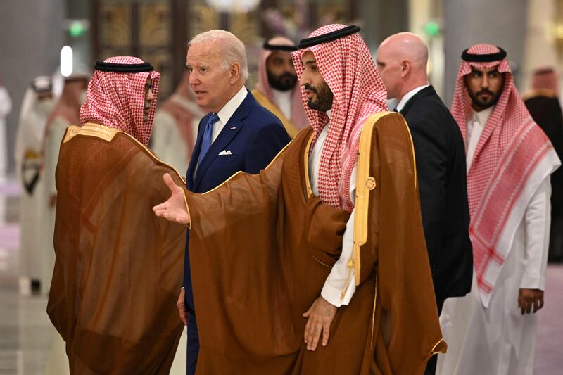 US President Joe Biden and Saudi Crown Prince Mohammed bin Salman arrive for the family photo. AP