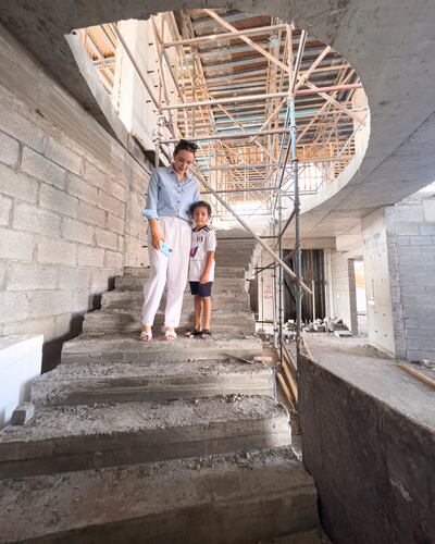Lauren Doble and her son Zayed at the construction site. Photo: Lauren Doble