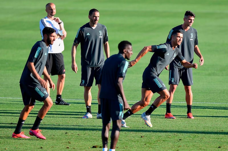 Cristiano Ronaldo training with teammates. AFP