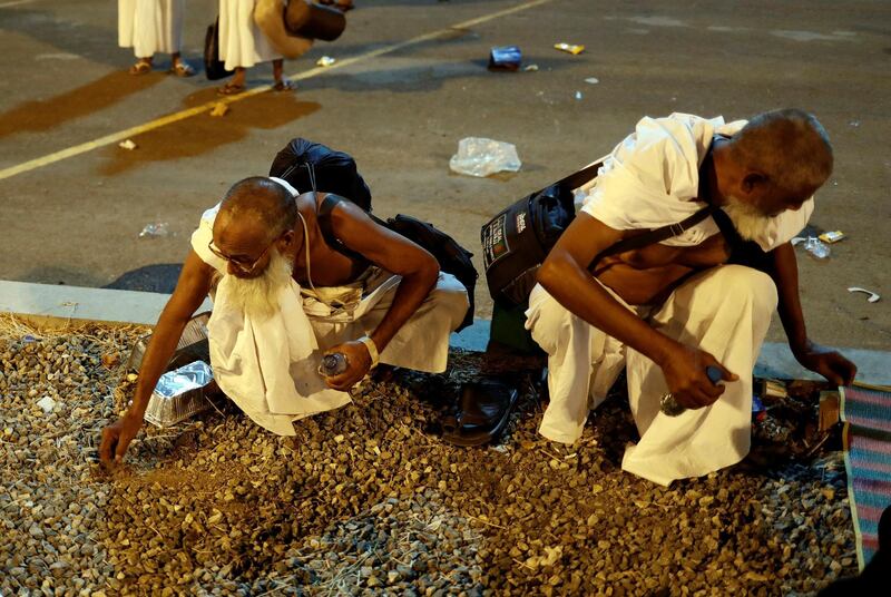 Muslim pilgrims collect pebbles in Muzdaliffah for the stoning ritual during Hajj in Mina, Saudi Arabia. Reuters
