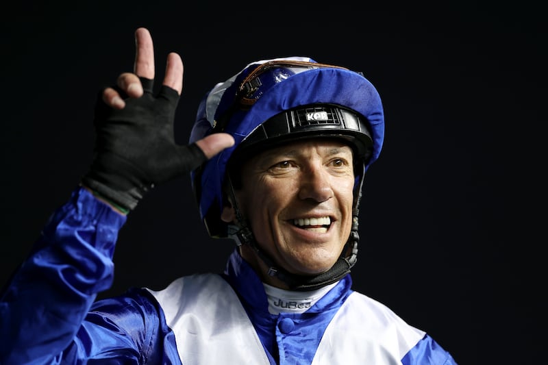 Frankie Dettori holds up three fingers to represent his three consecutive victories in the Dubai Turf while riding Lord North. Getty 