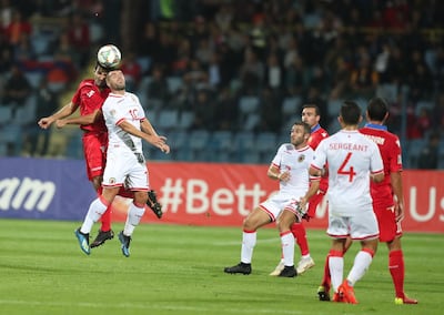 epa07092680 Liam Walker (2-L) of Gibraltar vies for the ball with Artak Grigoryan (L) of Armenia  during the UEFA Nations League soccer match between Armenia and Gibraltar in Yerevan, Armenia 13 October 2018. Gibraltar won their first-ever competitive match by 1-0.  EPA/VAHRAM BAGHDASARYAN