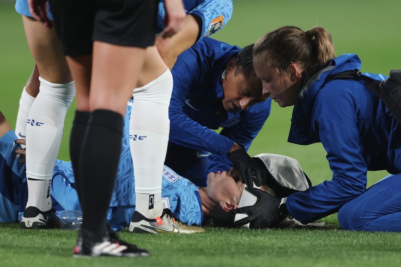 Alex Greenwood of England receives medical attention. Getty 