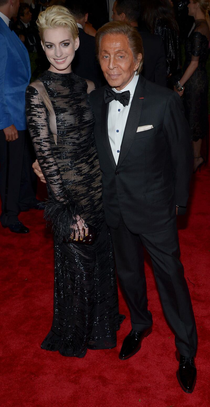 epa03690044 US actress Anne Hathaway and Italian Fashion Designer Valentino attend the Costume Institute Gala Benefit celebrating, 'Punk: Chaos to Couture,' an exhibition at the Metropolitan Museum of Art in New York, New York, USA, 06 May 2013.  EPA/JUSTIN LANE