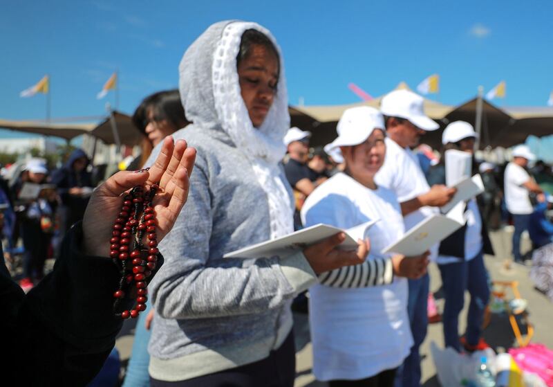 Abu Dhabi, U.A.E., February 5, 2019.  Worhipers strengthen their faith at the mass of His Holiness Pope Francis, Head of the Catholic Church at Zayed Sports City.
Victor Besa/The National
Section:  NA
Reporter:
