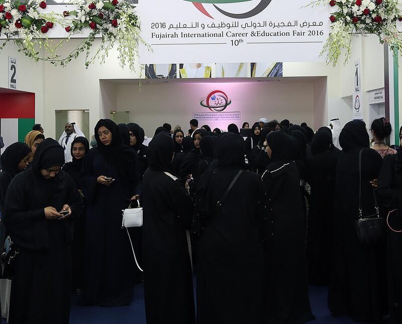 Emiratis attend the Fujairah International Career and Education Fair at the Fujairah Exhibition Centre. Satish Kumar / The National