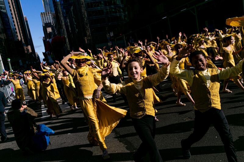 A marching band performs along Sixth Avenue during the Macy's Thanksgiving Day Parade in New York  in New York.  AP